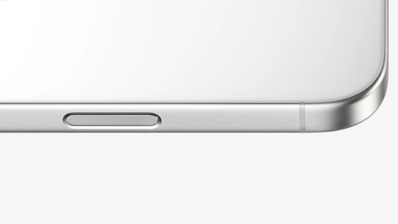 Close-up view of a silver-colored smartphone's side featuring a power button and a slightly curved edge.